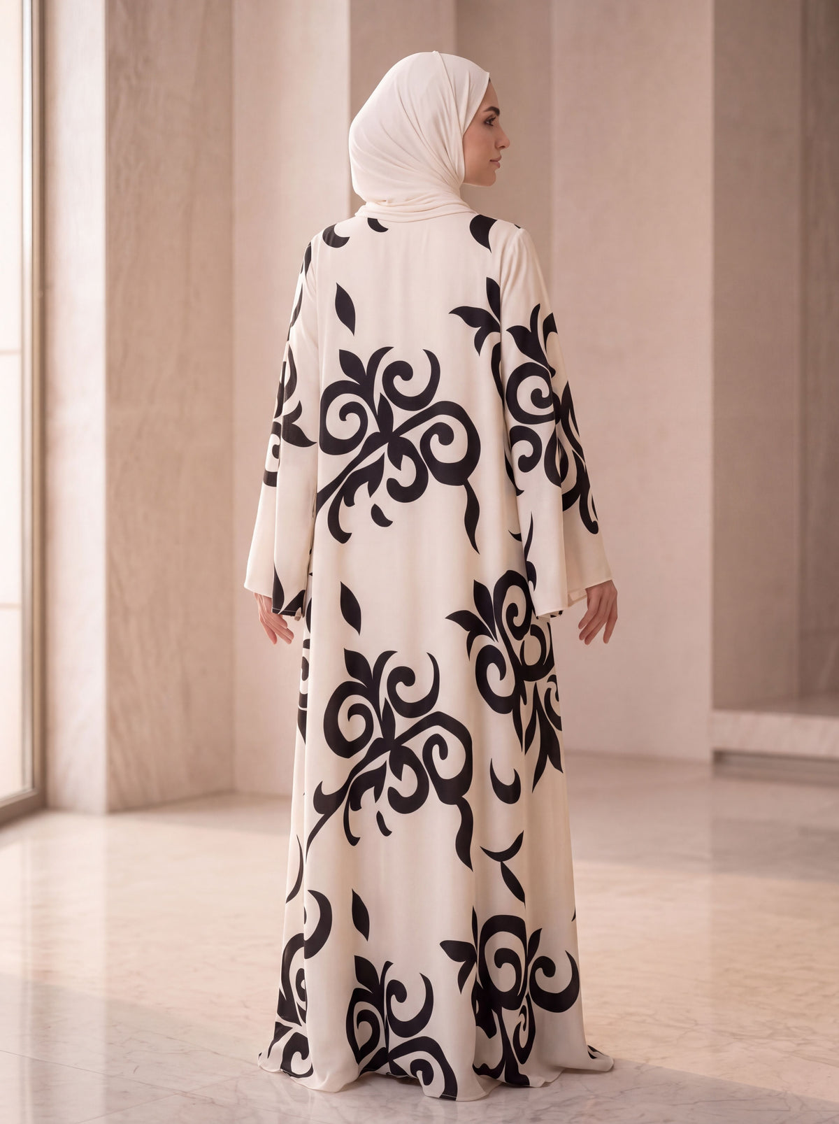 Nooraya Muse — Ivory Abaya with Bold Tribal Print